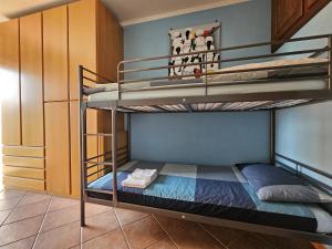 Postel nebo postele na pokoji v ubytování La casa rossa nel Monferrato a Moncucco Torinese