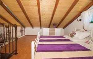 Postel nebo postele na pokoji v ubytování One-Bedroom Holiday Home In Smokvica