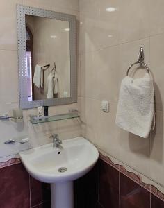 Koupelna v ubytování Areg Hotel
