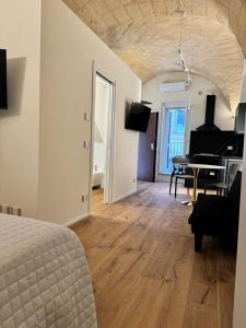 TV/trung tâm giải trí tại La Dimora Dell Artista LUXURY ROOM