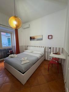 Postel nebo postele na pokoji v ubytování Naporà