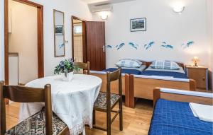 Posteľ alebo postele v izbe v ubytovaní Holiday Apartment Omis 07