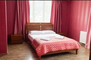 Katil atau katil-katil dalam bilik di Hotel in Bakuriani