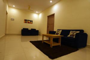 Posezení v ubytování Sandeep Serviced Apartments