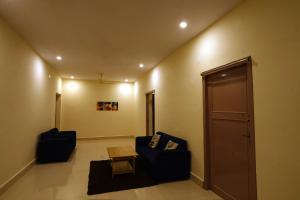 Posezení v ubytování Sandeep Serviced Apartments