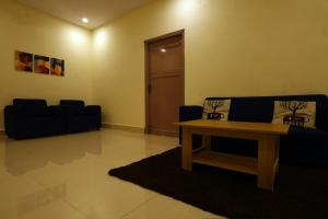 Posezení v ubytování Sandeep Serviced Apartments