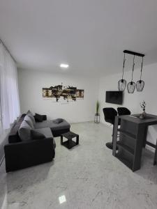 Posezení v ubytování Ferienhaus Eichen + 11 fotografií