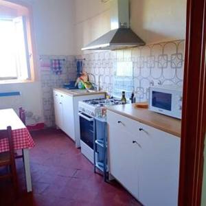 Кухня или мини-кухня в B&B La Casa Vecchia
