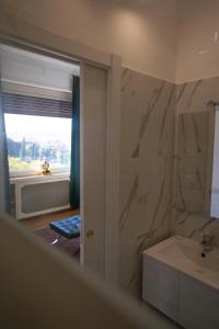 Koupelna v ubytování Terrazza Urania - Penthouse terrace with 360 view of Rome