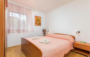 Posteľ alebo postele v izbe v ubytovaní Lovely Apartment In Fazana With Kitchen