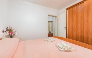 Posteľ alebo postele v izbe v ubytovaní Lovely Apartment In Fazana With Kitchen