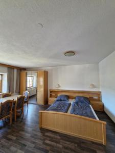 Postel nebo postele na pokoji v ubytování Haus Traube