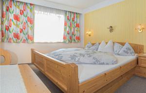 Postel nebo postele na pokoji v ubytování Haus Rosenheim Ferienwohnung