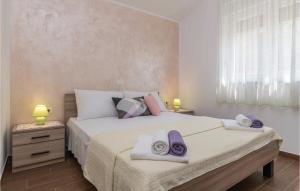 Posteľ alebo postele v izbe v ubytovaní Two-Bedroom Holiday Home In Vodnjan