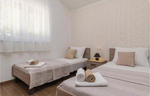 Posteľ alebo postele v izbe v ubytovaní Two-Bedroom Holiday Home In Vodnjan