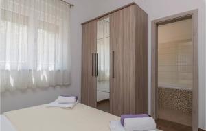 Posteľ alebo postele v izbe v ubytovaní Two-Bedroom Holiday Home In Vodnjan