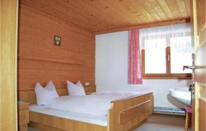 Posteľ alebo postele v izbe v ubytovaní Ferienhaus In Sonniger Lage