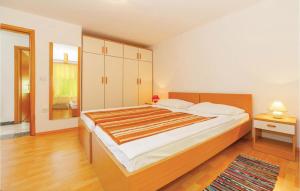 Posteľ alebo postele v izbe v ubytovaní Lovely Apartment In Grizane