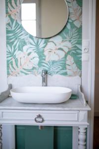 Fotografie z fotogalerie ubytování Le jardin de Gassiot offre étape pro v destinaci Saint-Quentin-de-Baron + 9 fotografií