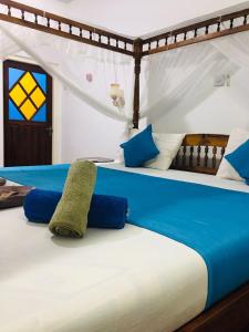 Postel nebo postele na pokoji v ubytování Avin Beach Villa