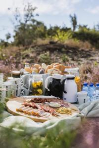 a table with food and drinks on it at Bij de Buurman in Dalmsholte