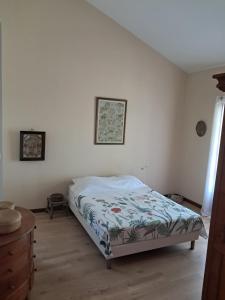 Postel nebo postele na pokoji v ubytování Maison de charme à Manapany