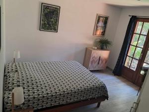 Postel nebo postele na pokoji v ubytování Maison de charme à Manapany