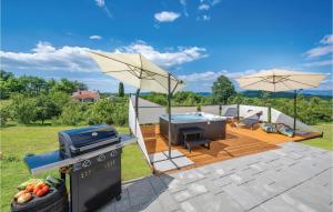 Posezení v ubytování Two-Bedroom Holiday Home In Rakotule