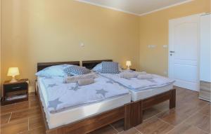Postel nebo postele na pokoji v ubytování Apartmani Keran