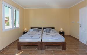 Postel nebo postele na pokoji v ubytování Apartmani Keran