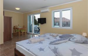 Postel nebo postele na pokoji v ubytování Apartmani Keran