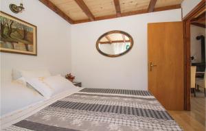 Postel nebo postele na pokoji v ubytování One-Bedroom Holiday Home In Smokvica