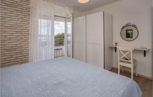 Posteľ alebo postele v izbe v ubytovaní 2 Bedroom Gorgeous Home In Karlobag