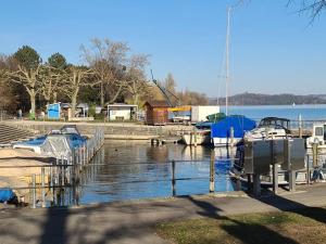a group of boats docked at a marina at Maison de charme entre ville et campagne in La Neuveville
