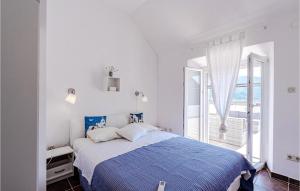 Postel nebo postele na pokoji v ubytování Three-Bedroom Holiday Home In Vela Luka