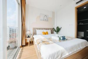 Voodi või voodid majutusasutuse The Euphoria Sophisticated Style - Stay 24h toas