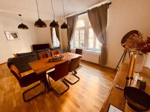 TV a/nebo společenská místnost v ubytování Ferienwohnung Mey Krämerbrückenblick + 19 fotografií