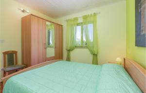 Postel nebo postele na pokoji v ubytování Apartment Kunfin V