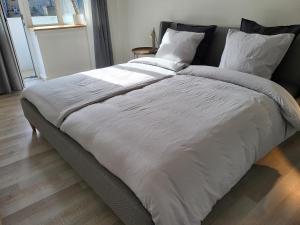 Postel nebo postele na pokoji v ubytování Apartment Sir Toby