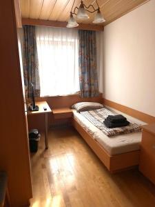 Postel nebo postele na pokoji v ubytování Havanna Pension