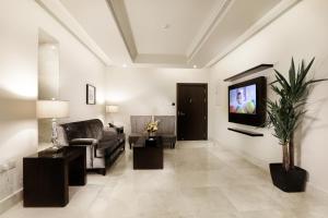 Кът за сядане в Aswar Hotel Suites Riyadh