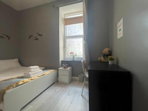 Uma cama ou camas num quarto em Leitrim Property Cork