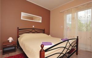 Postel nebo postele na pokoji v ubytování Holiday Home Vlaska Iii