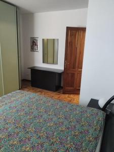 Postel nebo postele na pokoji v ubytování Appartamento Cogno