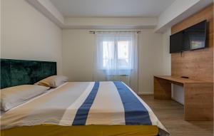 Posteľ alebo postele v izbe v ubytovaní Nice Apartment In Zadar With Kitchen