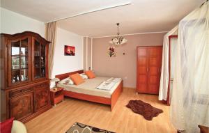 Postel nebo postele na pokoji v ubytování Apartment Okrug Gornji With Sea View 1