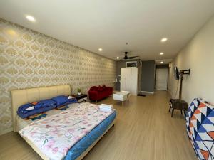 Postel nebo postele na pokoji v ubytování KF Homestay Premium Suite