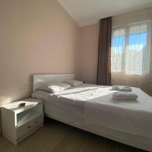 Postel nebo postele na pokoji v ubytování Guest House Deme