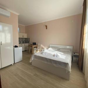 Postel nebo postele na pokoji v ubytování Guest House Deme