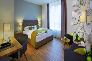 Postel nebo postele na pokoji v ubytování Hotel Kapellenberg
